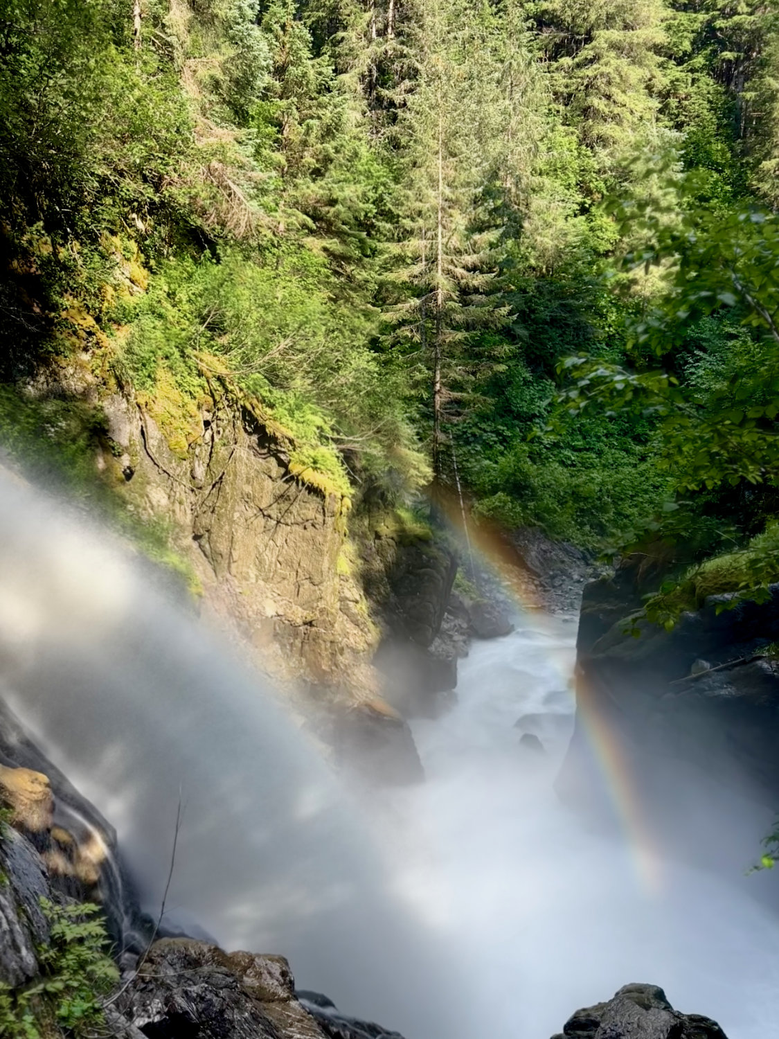 The beautiful waterfall on the Chutes and Ladders hike in Girwood Alaska