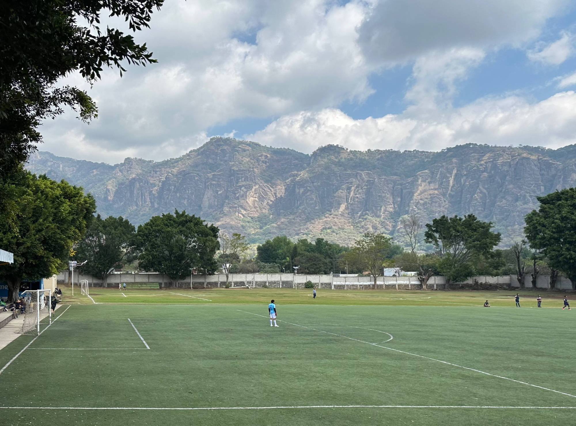 Local football field with mountain backdrop