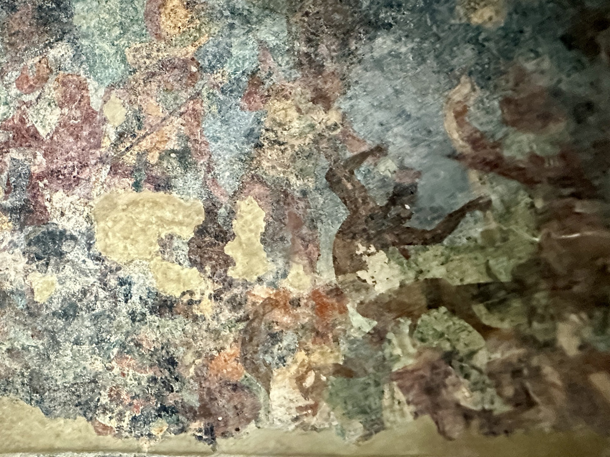 Dramatic battle scene showing Maya warriors in combat from Room 2