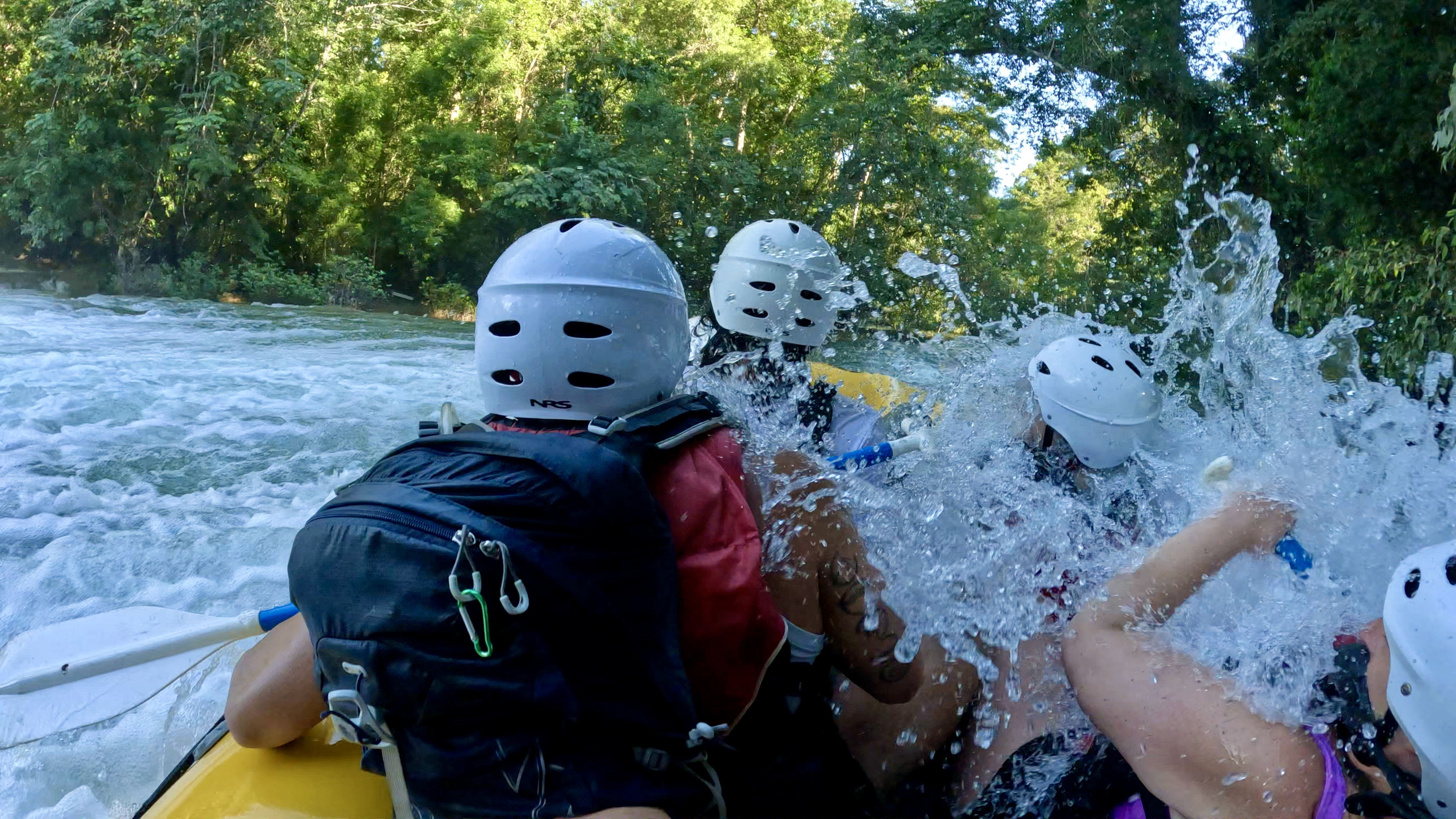 Spashed with water while rafting