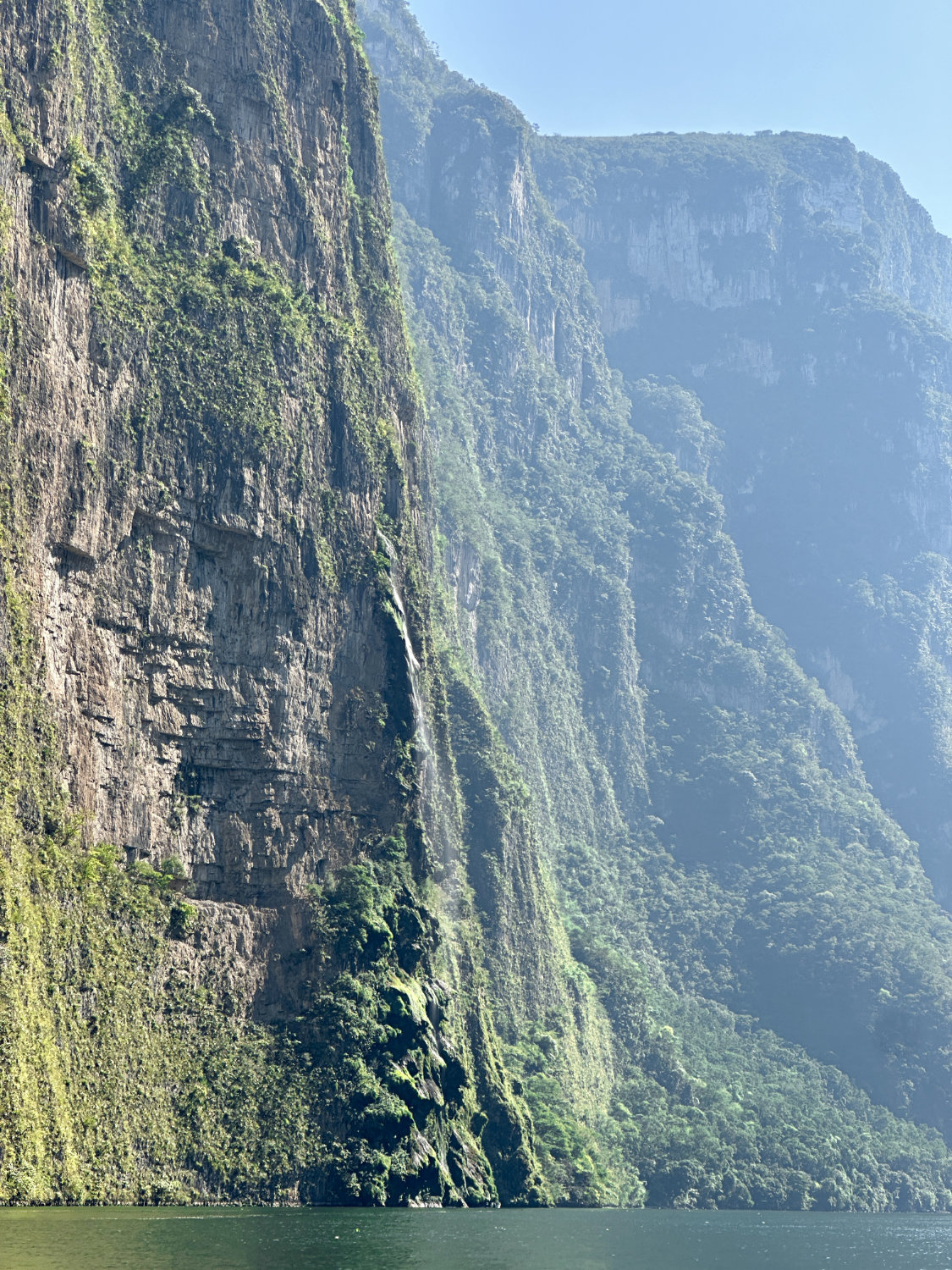 Sumidero Canyon dramatic cliff with Christmas tree waterfall