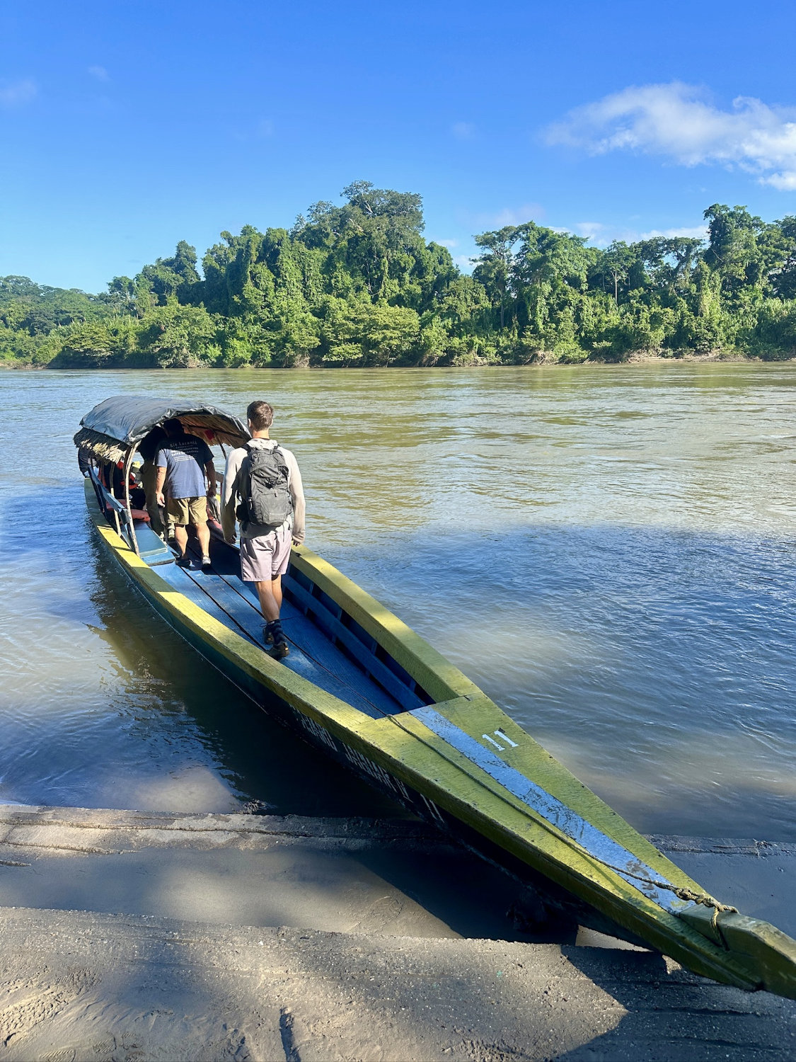 Mark boarding a lancha boat